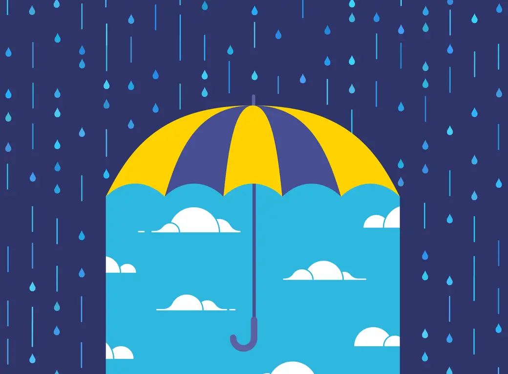 gelb-blauer Regenschirm im Regen, darunter klarer Himmel